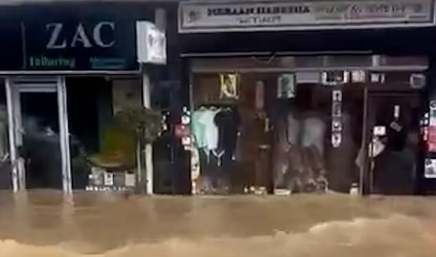 Shop owners and locals were left scared as dirty water rose following a 30-inch water main bursting