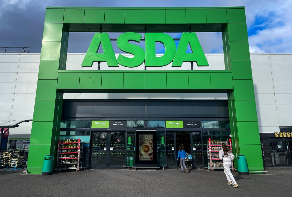 The exterior of an ASDA supermarket, with its green logo above the entrance.