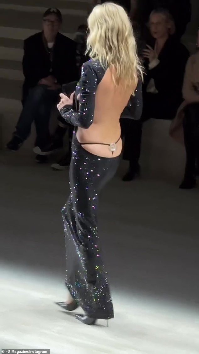 The supermodel, 52, looked incredible in a backless dress which featured cheeky thong detail