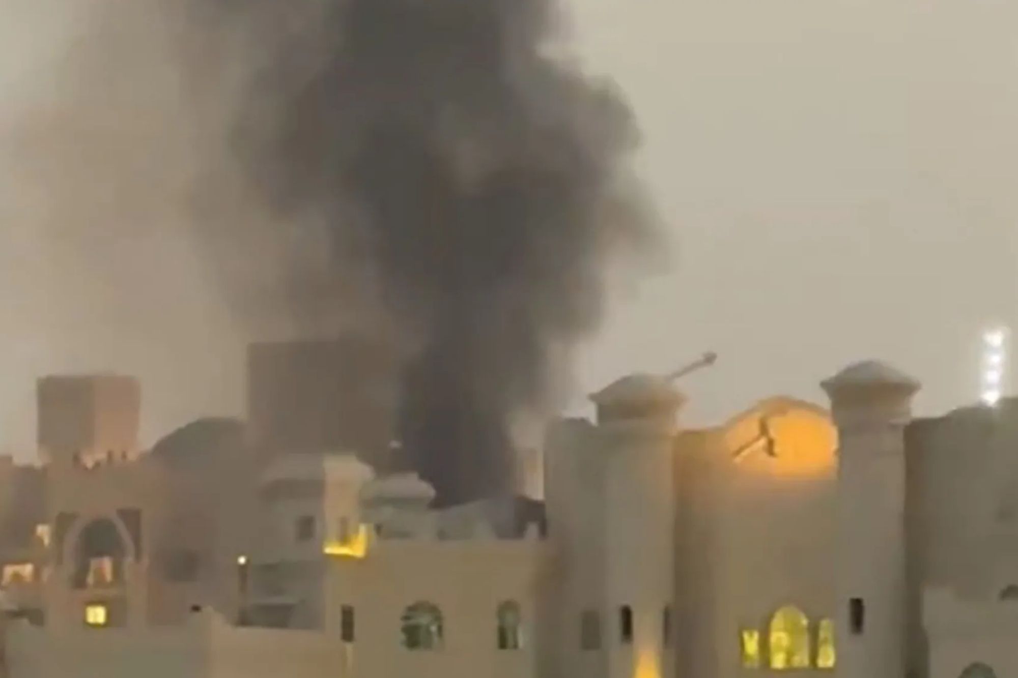 An image collage containing 1 images, Image 1 shows Smoke rising from the Palm Jumeirah in Dubai