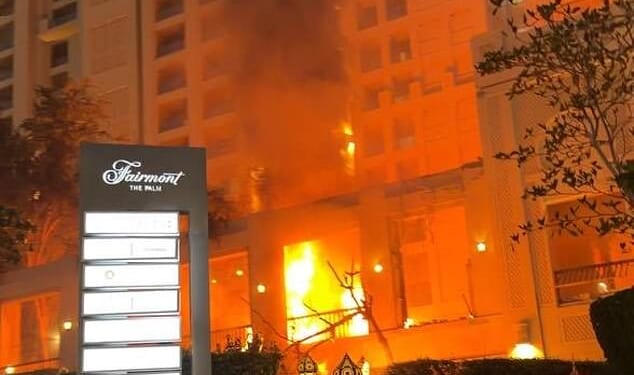 Dramatic footage and images have captured the moment the five-star Palm Jumeirah Fairmont Hotel was hit and set ablaze by an Iranian missile
