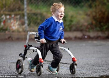 Jacob Fallows, four, has cerebral palsy and ran more than 100 miles in January to raise money for his school