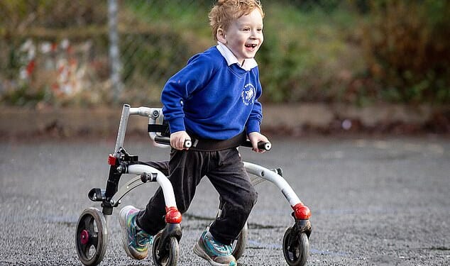 Jacob Fallows, four, has cerebral palsy and ran more than 100 miles in January to raise money for his school