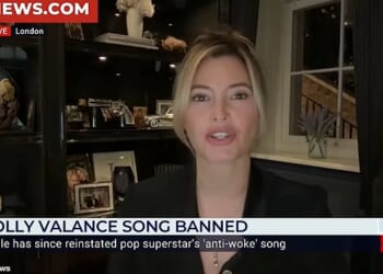 Holly Valance was cut off during a live interview on GB News on Monday night, after she used an offensive slur during a debate about the Coronavirus pandemic