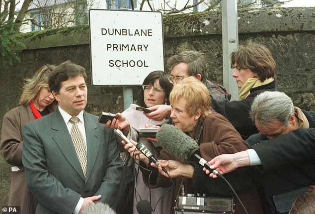 Headteacher Ron Taylor (pictured speaking to reporters on the first day back to school after the shootings) assumed the bangs he heard from his office were construction work