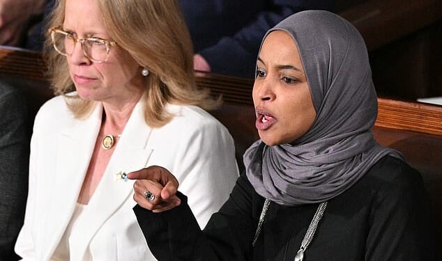 Representative Ilhan Omar has said her guest to the State of the Union was 'forcibly removed' from the House on Tuesday night