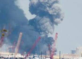 Explosions rocked Bahrain ¿ the home of the US Fifth Fleet ¿ as Iran's Foreign Ministry threatened to attack all American military assets in the region