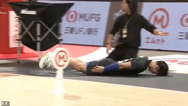 The 26-year-old slid across the court in apology after hitting one of the female judges