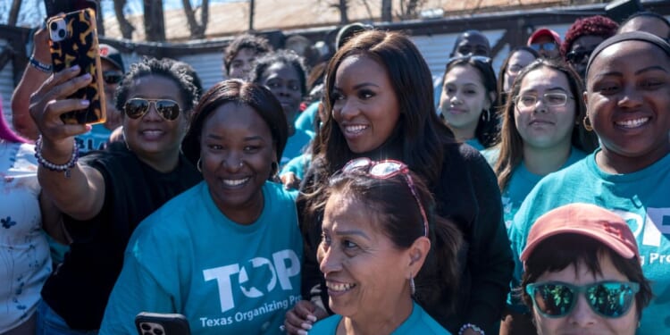 Rep. Jasmine Crockett gathers with supporters at a campaign rally on Feb. 22, 2026, in San Antonio, Texas.
