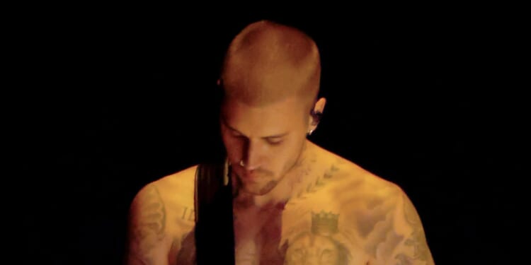 Justin Bieber baffles fans as he performs in UNDERWEAR and stares in mirror for first Grammys performance in 4 years