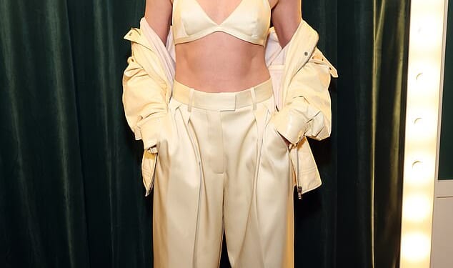 Kristen Stewart flashed her abs in a daring bra top at the Architectural Digest event in West Hollywood on Tuesday