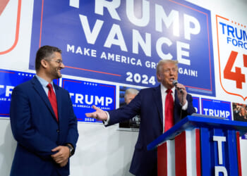 Then-Republican presidential nominee and former President Donald Trump is seen in a file photo dated Oct. 18, 2024, at a campaign appearance in Hamtramck, Michigan, speaking as Hamtramck Mayor Amer Ghalib listens.
