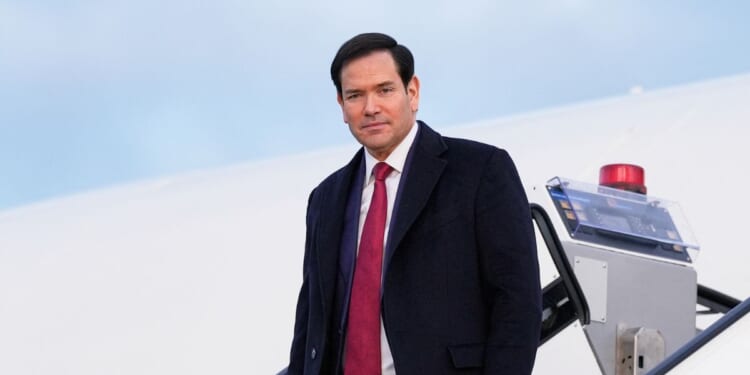 Secretary of State Marco Rubio disembarks from his plane on Feb. 13, 2026, before attending the Munich Security Conference in Munich, Germany.