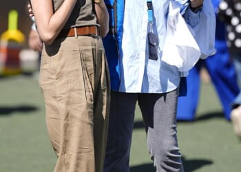 The Duchess of Sussex appeared to channel Angelina Jolie during a visit to the QuestScope Youth Center at the Za'atari refugee camp on Wednesday