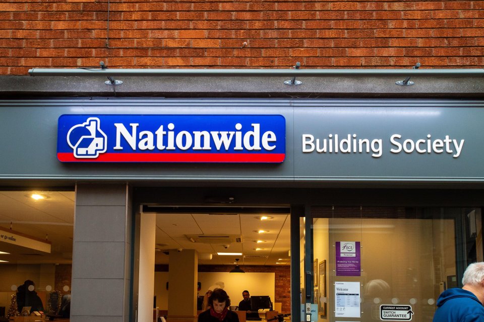 A Nationwide Building Society branch building with a logo and sign.