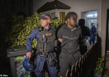A warrant was executed in the early hours of Thursday, and three men aged 21, 19 and 18, from north London , were arrested along with a 31-year-old man from north-west London, police said