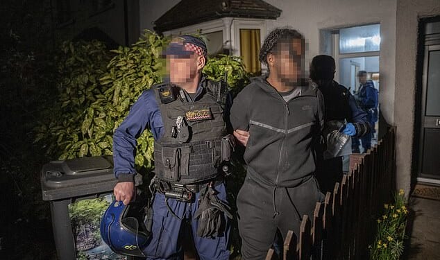 A warrant was executed in the early hours of Thursday, and three men aged 21, 19 and 18, from north London , were arrested along with a 31-year-old man from north-west London, police said