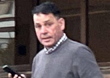 Patrick Maughan, 54, is pictured outside court. Maughan disputes encouraging or assisting his son