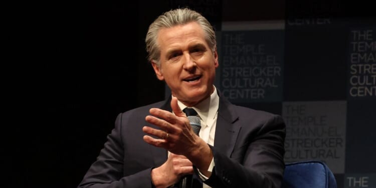 California Gov. Gavin Newsom speaks with Harry Sisson to promote his book, "Young Man in a Hurry," at the Streicker Cultural Center in New York on Feb. 24, 2026.