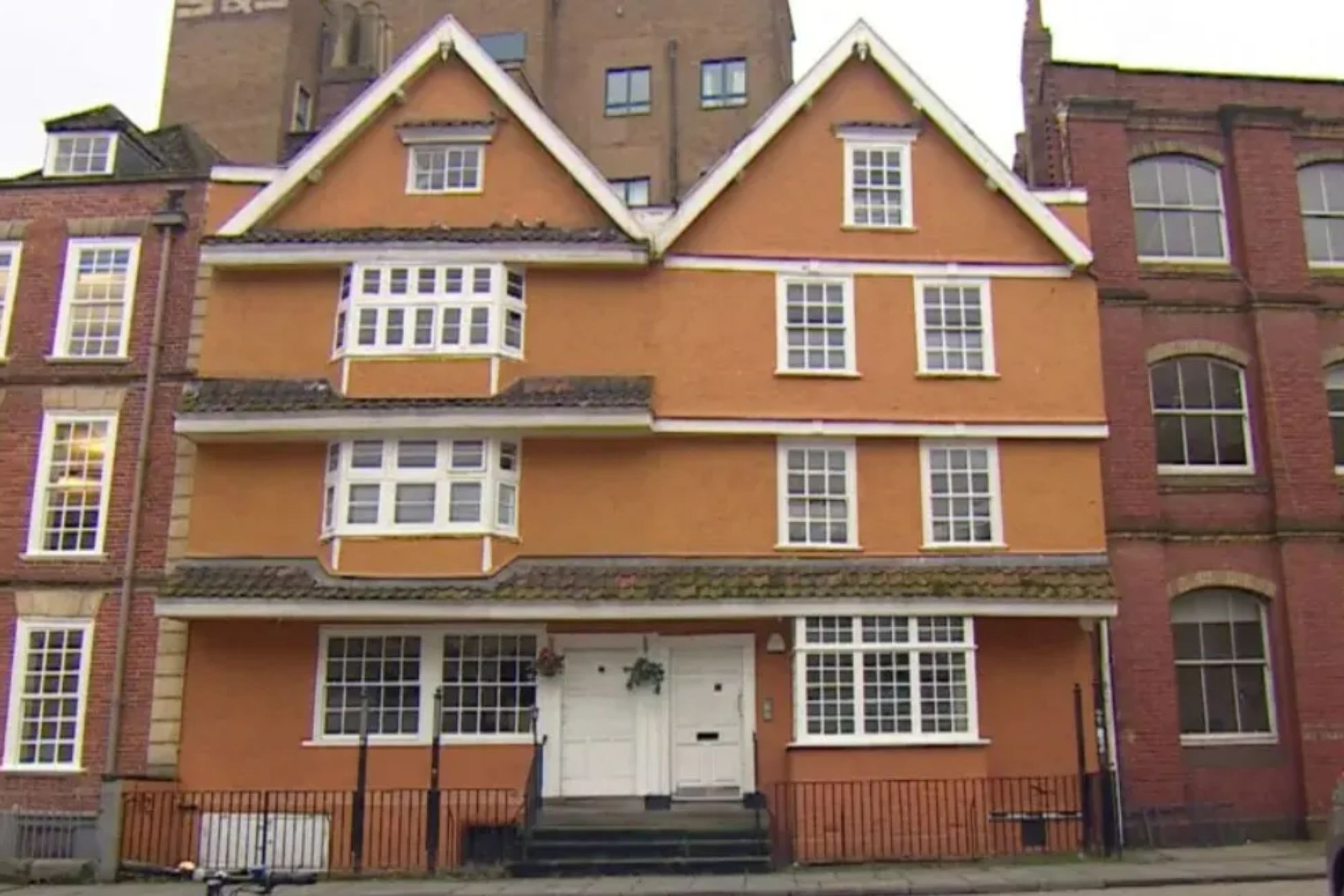 An image collage containing 1 images, Image 1 shows Partou Nursery, located in an orange building with two peaked roofs, in King Street, Bristol
