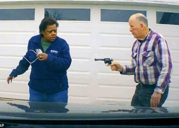 In this image taken from dashcam video released by the Clark County Sheriff's Office, William Brock can be seen pointing a pistol at Uber driver Lo-Letha Toland-Hall, 61