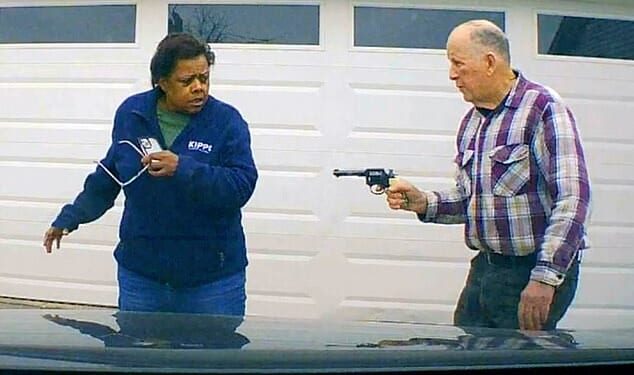 In this image taken from dashcam video released by the Clark County Sheriff's Office, William Brock can be seen pointing a pistol at Uber driver Lo-Letha Toland-Hall, 61