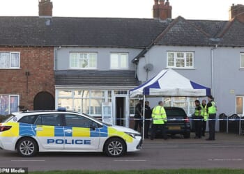 Police at the scene on Yardley Wood Road in Birmingham where DC Tayyab Malik was found