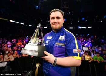 Luke Littler celebrated at the O2 Arena in London after becoming the youngest Premier League winner by lifting the trophy on his debut appearance aged just 17 in 2024