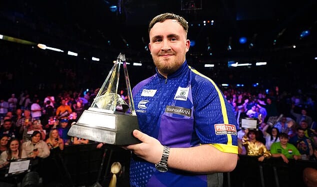 Luke Littler celebrated at the O2 Arena in London after becoming the youngest Premier League winner by lifting the trophy on his debut appearance aged just 17 in 2024