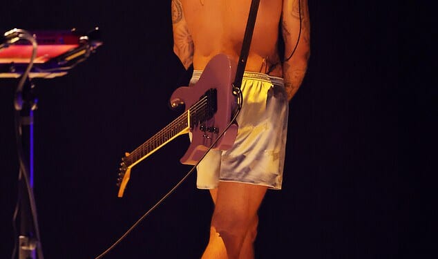 Justin Bieberwas the talk of the night at the Grammysafter performing in his boxers and revealing a new tattoo of his wife Hailey's face on Sunday