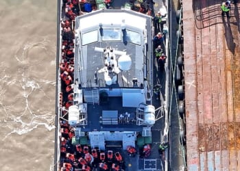Channel boat migrants (pictured on Wednesday) are being waved on to British soil without strict security checks when they disembark, a Daily Mail investigation can reveal