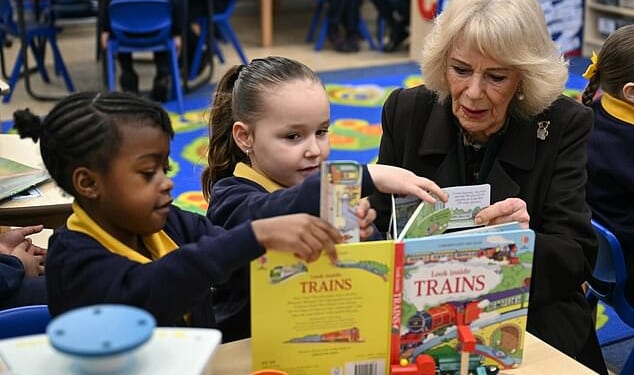 Queen Camilla meets with pupils as she attends the opening of a library at Christ Church Primary School in London