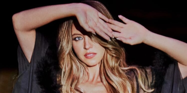 Sydney Sweeney seduces fans in black lace thong and thigh-high stockings for most risqué lingerie look yet