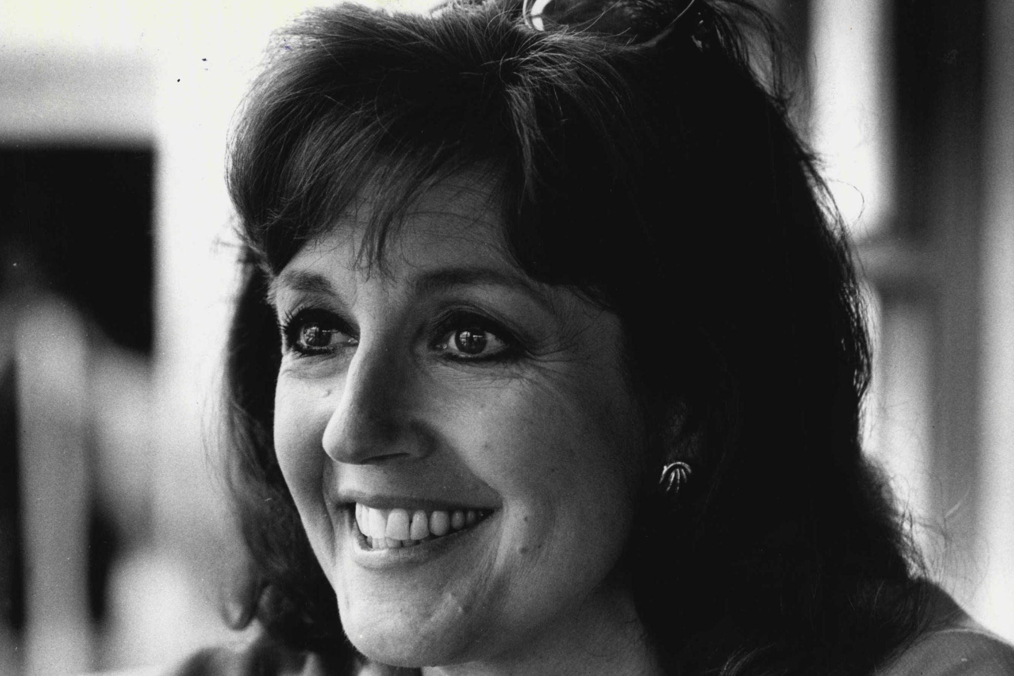 An image collage containing 1 images, Image 1 shows Black and white photo of Australian actress Lorraine Bayly smiling while looking slightly up and to the right