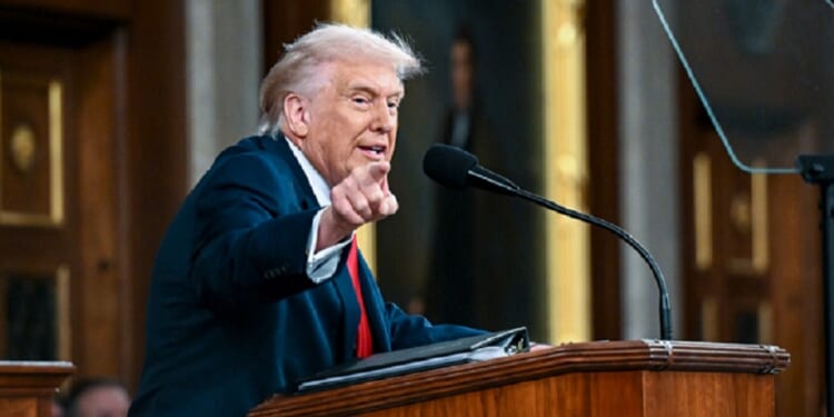 President Donald Trump points an accusing finger at the Democratic side of his audience during Tuesday's State of the Union address in the Capitol.