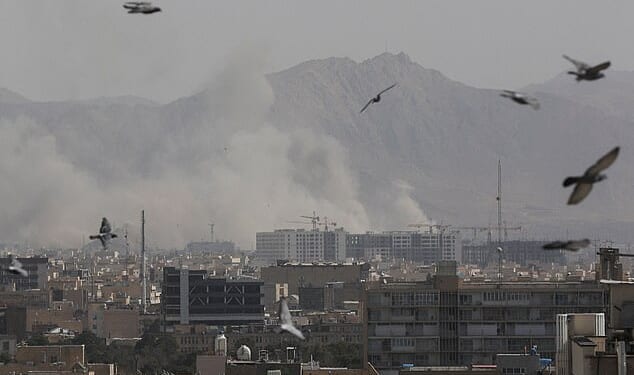 Smoke can be seen rising over Tehran, Iran Saturday morning after the US and Israel conducted 'major' operations after nuclear negotiations between the US and Iran broke down