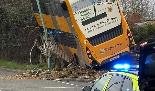 Two people have been rushed to hospital after a double-decker bus was involved in a crash with a car