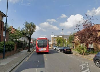 Woman, 50, stabbed to death in 'busy' street as man, 30, 'known to her' is arrested over 'murder'