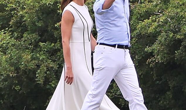 The Princess of Wales has revealed that her family have welcomed a new furry member (pictured with the Prince of Wales in Egham, 2022)