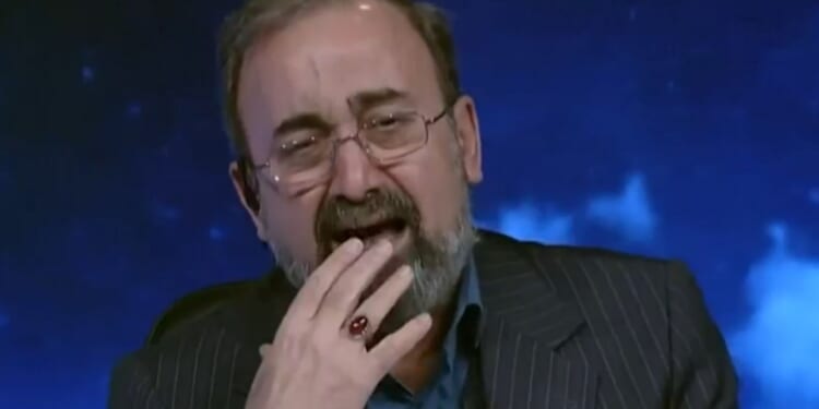 Pathetic moment Iran state TV presenter SOBS as he announces death of Ayatollah as nation reveals 40 days of mourning