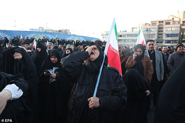 Mourners react following the death of Iranian Supreme Leader Ayatollah Ali Khamenei in Tehran, Iran