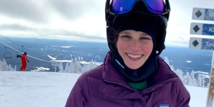 This happy ski holiday snap was taken an hour before I nearly died & woke up quadriplegic