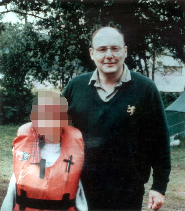 Thomas Hamilton with one of the members of a youth group he led before his horrific crime