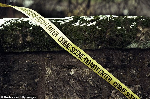 A crime scene ribbon outside the school in the Scottish town in the aftermath of the shooting