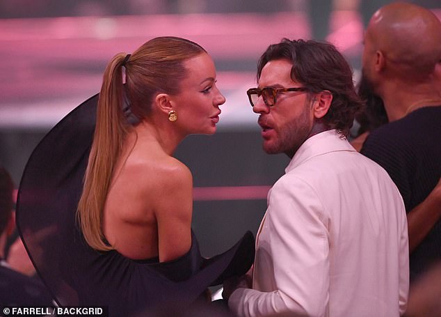 She admitted at the time, she could understand why the images made her footballer husband 'upset' and confessed her marriage was a 'work in progress'