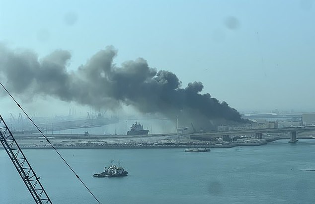 Smoke billows from the Abu Dhabi port, where there is a French naval base