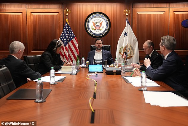 Vice President JD Vance speaks with top Trump officials, including National Intelligence Director Tulsi Gabbard at the Situation Room in Washington DC