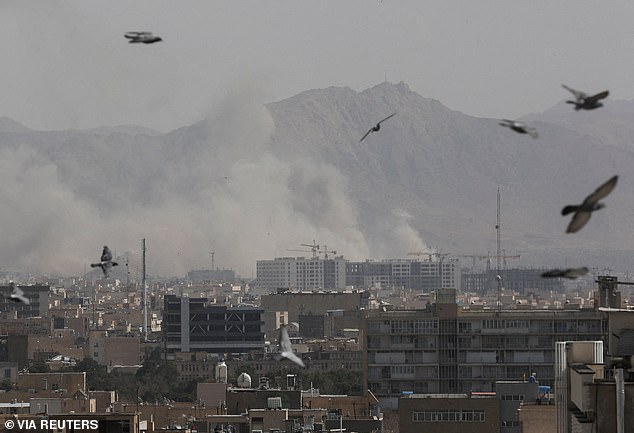 Smoke rises in Tehran following an explosion after the first round of Saturday morning on the Iranian regime, with US and Israeli forces both involved in the attack