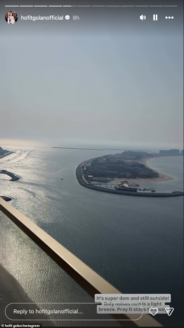 Later filming the view from her balcony, she said: 'The Palm is calm and still just, it is the beautiful perfect day actually, its beautiful and so calm, there's people on the beach'