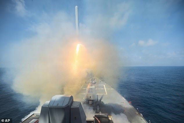 In this image provided by U.S. Central Command, the Arleigh Burke-class guided-missile destroyer USS Spruance (DDG 111) fires a Tomahawk Land Attack Missile (TLAM) in support of Operation Epic Fury, on Saturday